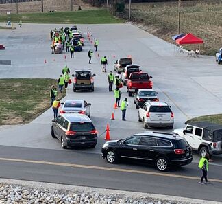 Cars lined up in parking lot